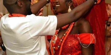 2baba unveiling Natasha Osawaru during their traditional wedding