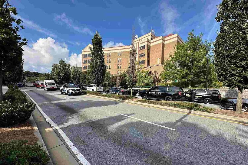 Emergency vehicles line up near Emory University and Centers for Disease Control and Prevention headquarters in Atlanta, Aug. 8, 2025.