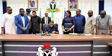 Cross Rivers State Governor, Bassey Otu, signing the bill on Thursday. Credit: State House