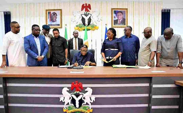 Cross Rivers State Governor, Bassey Otu, signing the bill on Thursday. Credit: State House