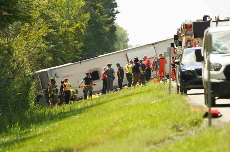 A tour bus that crashed and rolled over on the New York State Thruway near Pembroke, New York